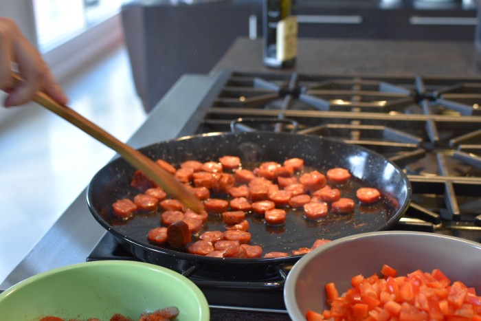 Sauteing Spanish Chorizo in paella pan