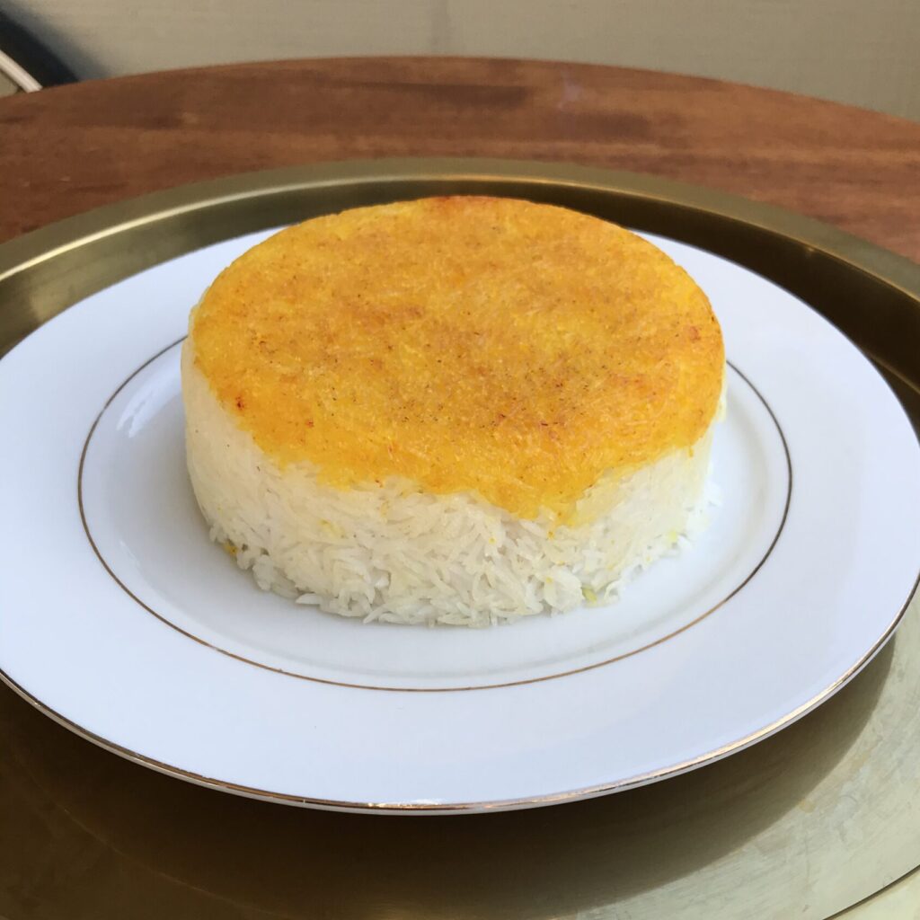 Inverted Persian rice with saffron tahdig