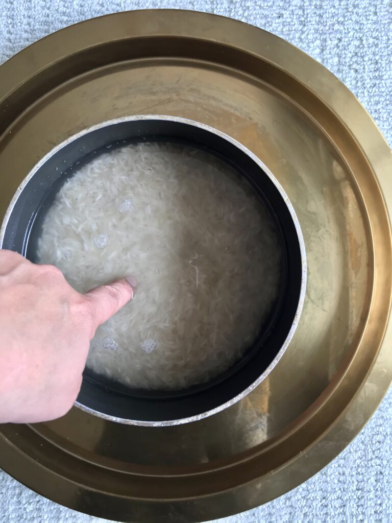 Cover uncooked rice with an inch of cold water