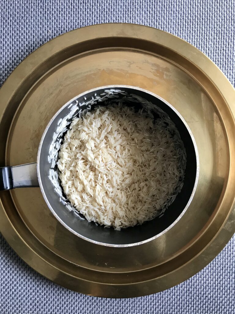 Rinsed white basmati rice ready to be cooked