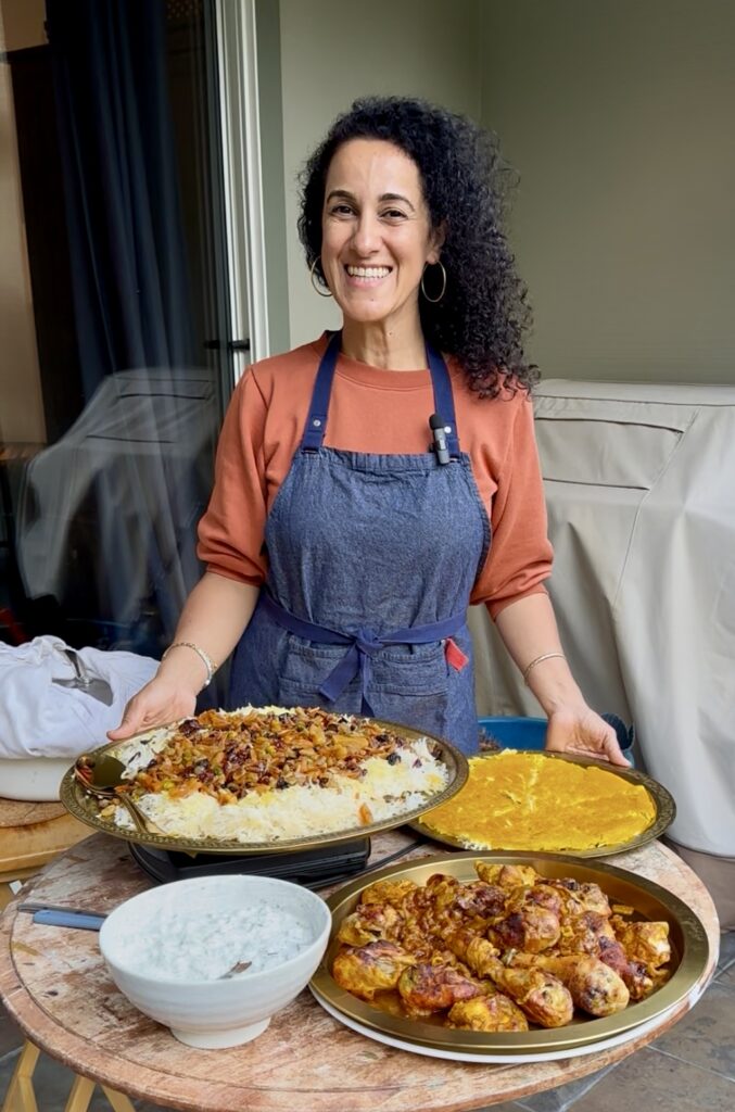 Learn how to make the vibrant and delicious Persian Jeweled Rice with braised chicken and tahdig.